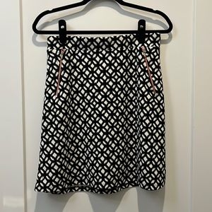 black and white patterned pencil skirt with red detail
